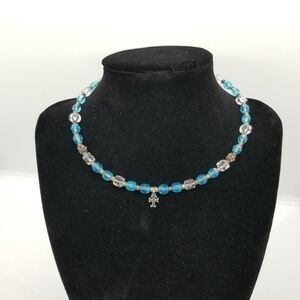 blue and clear beaded choker with sterling silver cross charm